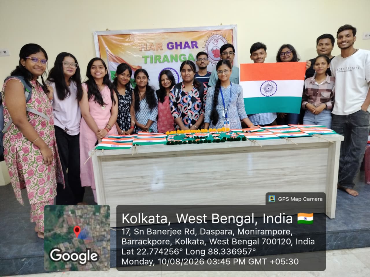 Students and faculty with the National Flag